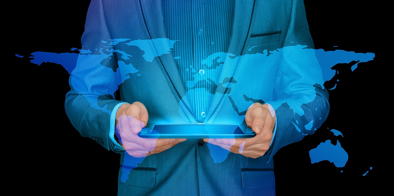 Businessman, internet, continents — Scale Your Business Online with Garage2Global - Complete Guide